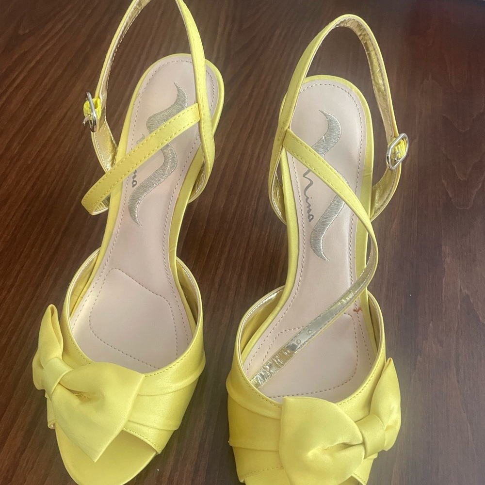 NIB canary yellow peep toe with bow heels by Nina
